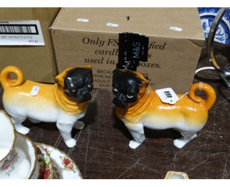A Pair of Continental China Model Standing Pugs