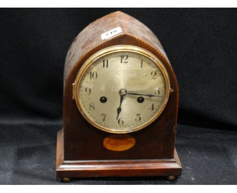 An Edwardian Mahogany Mantle Clock with Circular Silver Dial