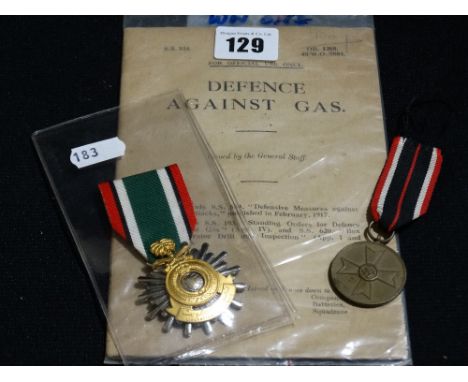 A First Gulf War Medal Together With A First World War Defence Against Gas Leaflet Etc
