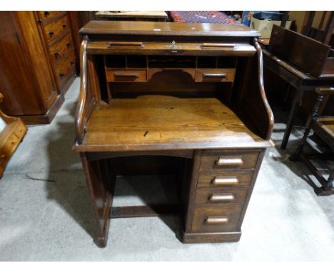 An Early 20th Century Oak Roll Top Desk by Harris Lebus