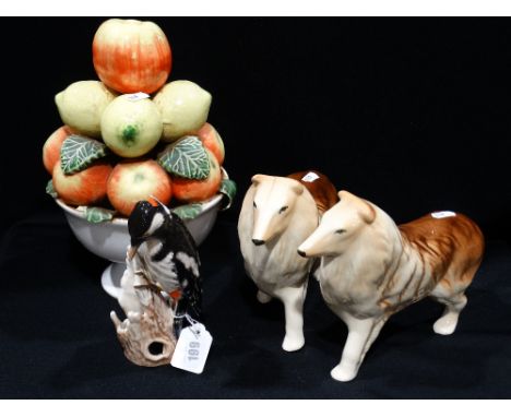 A Goebels Model Woodpecker Together with Two Pottery Dogs Etc