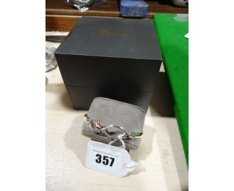 A Boxed Clogau Silver and Gold Love Heart Bangle
