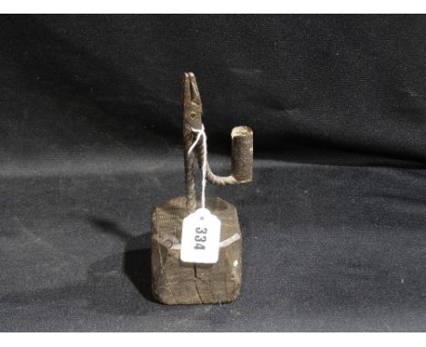 An Antique Wrought Iron Rush Light Holder and Candle Holder combined,  with Twist Column and Wooden Base