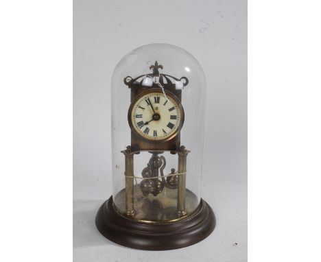 Glass domed clock, with an enamel dial and Roman hours