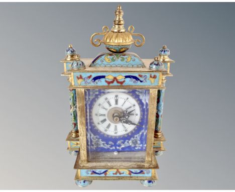 A Champlève enamel mantel clock with battery movement. (height 19cm)