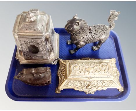 A tray containing a brass desk stand, silver plated caddy, a smaller iron ornament and an incense burner in the form of a cat