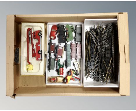 A box containing boxed Corgi toys no. 1127, Simon Snorkel Fire Engine, together with further die cast cars and rolling stock,