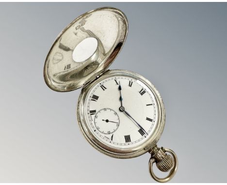 A silver half hunter pocket watch, Dennison watch case Ltd, Birmingham 1925