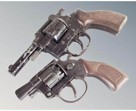 Two vintage starting pistols.