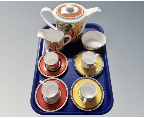 A tray of 11 pieces of Wedgwood Clarice Cliff limited edition coffee china.