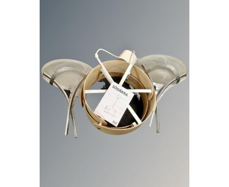 Two IKEA Sodakra light fittings together with two further wall lights with frosted glass shades.