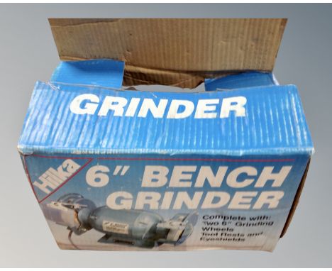 A boxed Hilka 6" bench grinder.