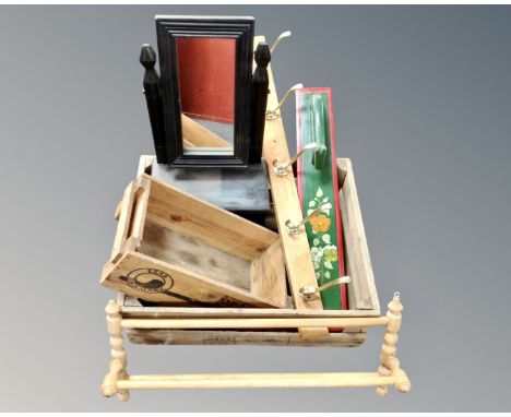 A vintage pine crate containing dressing table mirror, coat racks, smaller crate etc.