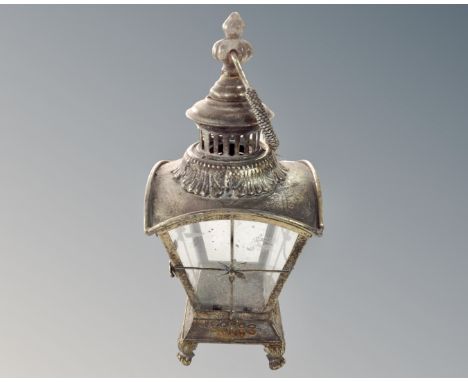 A brass hanging lamp.
