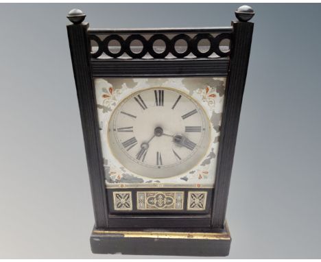 A late Victorian ebonised mantel clock. (height 32cm)