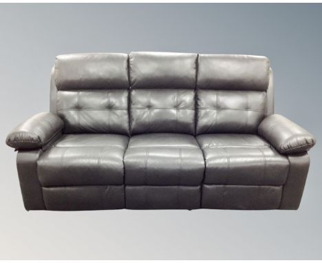 A three piece black leather manual reclining lounge suite comprising three seater measuring 195cm wide, two seater settee and