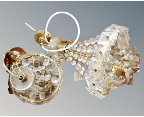 Two pendant light fittings with glass droplets.