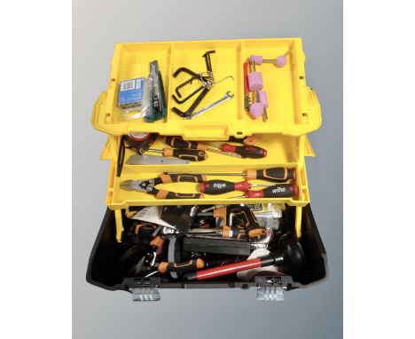A Stanley toolbox containing assorted hand tools.