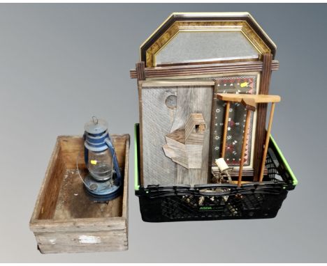 A rustic pine crate together with a further plastic crate containing a contemporary mirror, framed embroidery, oil lamp etc.
