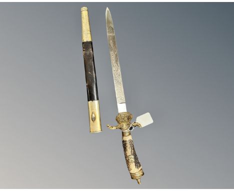 A reproduction Nazi German style hunting sword with antler grip.
