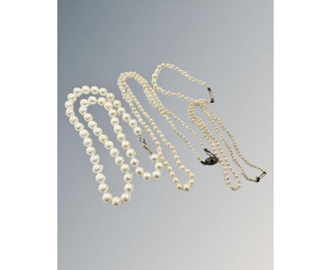 Two antique pearl necklaces, together with pearl child's bracelet and later pearl necklace on sterling silver clasp. (4)