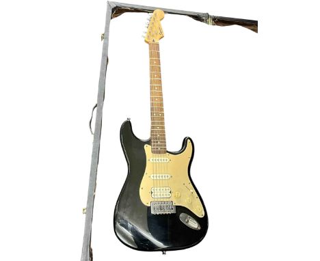 Squier Strat by Fender electric guitar with case.