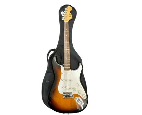 Squier by Fender electric guitar with bag.