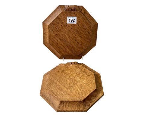 Two Robert Thompson of Kilburn 'Mouseman' small octagonal chopping boards, 20cm across.