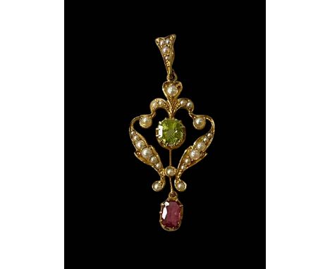 Edwardian 15 carat gold, peridot, ruby and seed pearl pendant, 4.4cm drop.