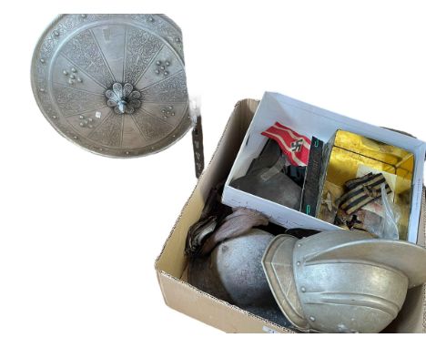 Collection of militaria including helmets, caps, shield, flying helmet and goggles, gun holster, badges, arm band, etc.
