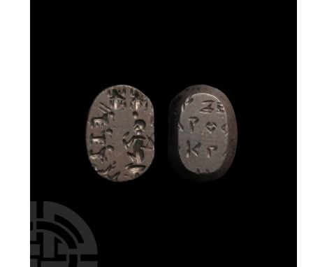 3rd-5th century A.D. An engraved gemstone with a stylised image of Harpocrates, depicted as a naked child with a finger raise