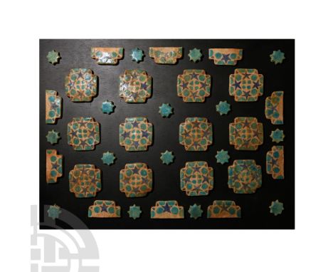 13th-14th century A.D. A mixed group of glazed ceramic floor tiles: 16 small star-shaped examples with blue glaze finish; 12 