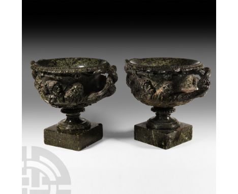 18th-19th century A.D. A pair of carved porphyry vases modelled on the famous 2nd century A.D. Roman Warwick Vase with Bacchi