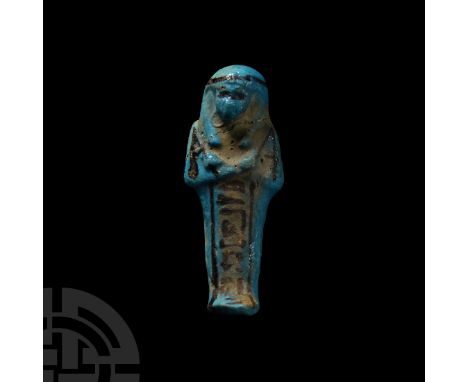 Third Intermediate Period, 21st Dynasty, 1081-931 B.C. A bright blue glazed worker shabti modelled on a rectangular base, arm