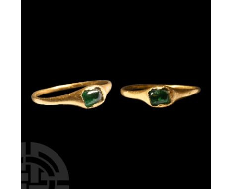 13th-14th century A.D. A slender gold finger ring with inset emerald cabochon to the bezel. Cf. Chadour, A.B., Rings. The Ali