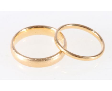 18ct yellow gold wedding band, 4.14g, size K and another thinner, 1.40g, size I/J. (2)