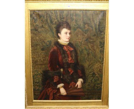ATTRIBUTED TO MARIA BROOKS (BRITISH, 1837-1916)19th century three quarter length portrait of a lady in a crimson dress with f