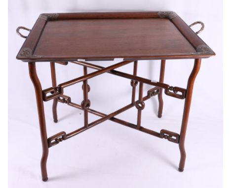 19th century Chinese rosewood tray and stand, the large tray with silver mounts by Wang Hing to the corners with repoussé pan