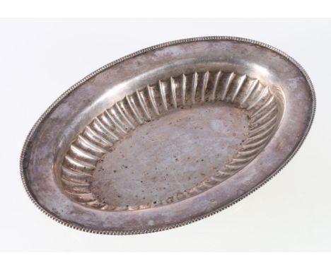 20th century silver oval dish, with beaded border stamped 'sterling', 27cm long, 333g.