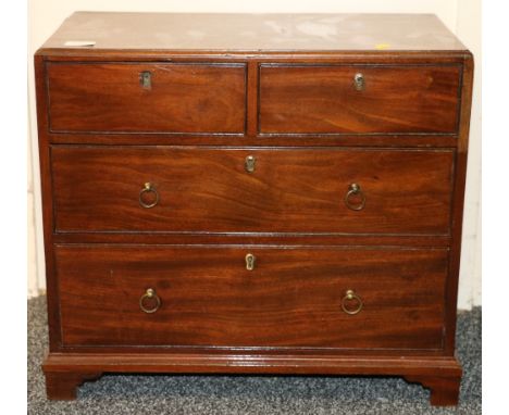 Victorian mahogany apprentice chest of two short over two long drawers raised on bracket supports, 46cm wide, 41cm tall, 25cm