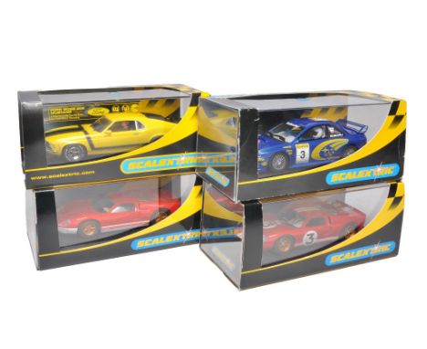 Scalextric slot car issues comprising Subaru Impreza WRC, Ford GT MKH, 1966 Le Mans, Ford GT40 MK II 2003 plus Ford Mustang B