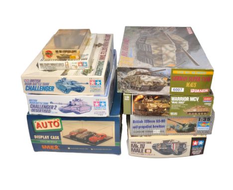 A group of eight Tank plastic model kits by Academy, Trumpeter, Tamiya, Dragon and Airfix  plus an Imex Display Case. All loo