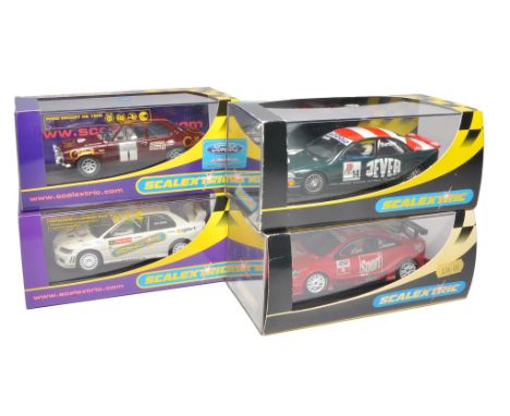 Scalextric slot car issues comprising Audi A4, Ford Escort, Opel V8 Coupe plus Mitsubishi Lancer, Evolution 7 WRC. All appear