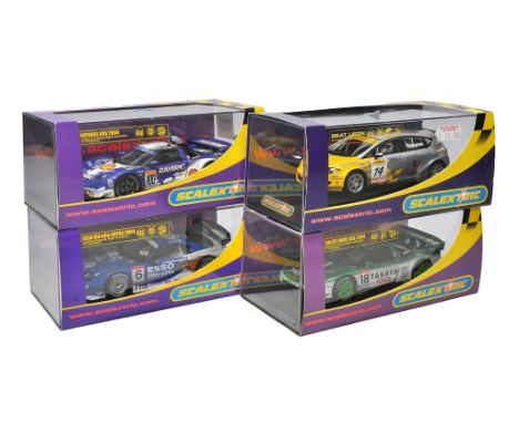 Scalextric slot car issues comprising James Thompson Seat Leon BTCC, Raybrig NSX 2004 no.100, Esso Ultraflow Sutpa 2004 no.6 