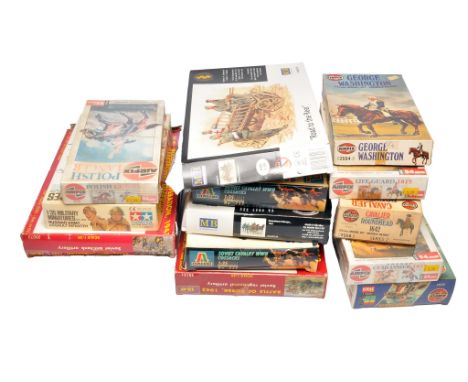 A group of fourteen figure plastic model kits by MIB, ICM and Airfix to include Airfix Polish Lancer, Tamiya Russian Army Ass