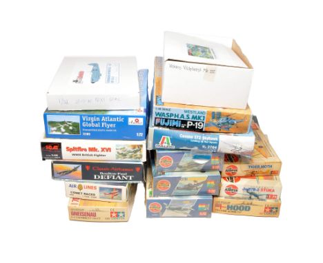 A group of fifteen plastic model kits to include ICM Spitfire Mk. XVI, Airfix Bristol Beaufighter TF.X, Fujimi Westland Wasp 