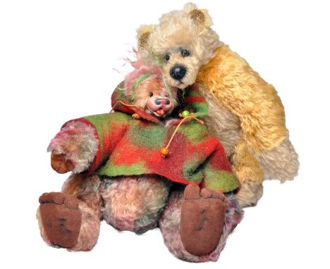 A pair of Artist designed teddy bears to include 1)Christine Pike bear, blonde and beige mohair, black glass eyes, black claw