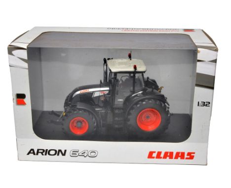 Universal Hobbies 1/32 farm model issue comprising Claas Arion 640 Rickerby Show 2011 Tractor. Excellent and secure in box.
