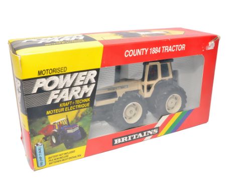 Britains 1/32 Farm Model Issue comprising No. 9324 County 1884 Powerfarm Tractor. Displays very good to excellent, minor fadi