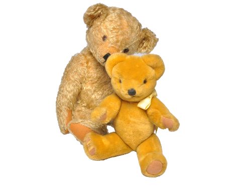 Duo of bears to include 1970’s Merrythought ‘M’ design golden mohair bear, rounded nose, flat ears, short tapering arms with 